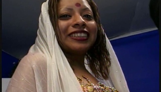 Freaky Indian chick Indra Verma sucking two brown dicks porn pics