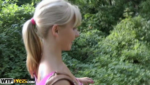 Slim kinky blondie undresses in the park and gonna masturbate on cam porn pics