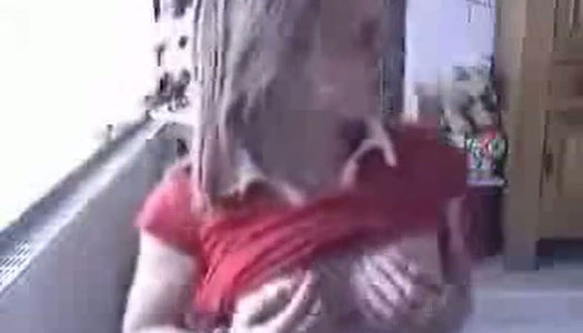 Short haired brunette strips and plays with her tits on webcam passionately porn pics