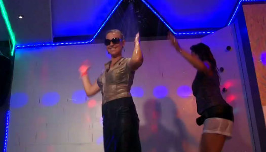 Provocative chick are dancing on a stage in the club porn pics