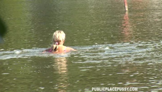 Amateur curvy light haired chick Eva Z swims in the river and shows her body porn pics