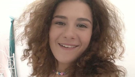 Curly brunette chick strips showing off her temoting body porn pics