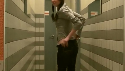Slutty brunette amateur gives mouth fuck to two sturdy cocks in public toilet porn pics