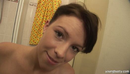 Whorish Hika mastubates in a bathroom using smooth sex toy porn pics