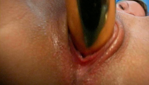 Playful blond chic pokes her wet vagina with dildo in doggy position porn pics