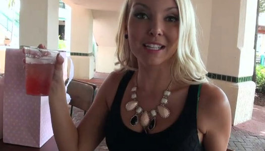 Whorish blonde is fingering her insatiable pussy in the car porn pics