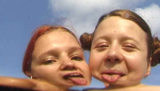 Lustful lesbians fuck each other's pussies in the pool porn pics