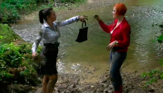 Couple of horny chicks get horny and start a fight in mud lake porn pics