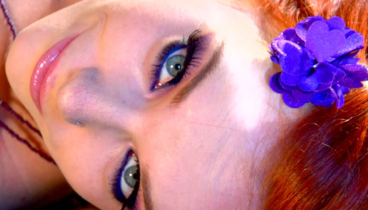 Hot redhead Dani Jensen gives blowjob on pool porn pics