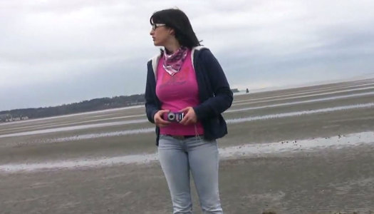 Short haired brunette Shelly provides a man with a blowjob on the beach porn pics