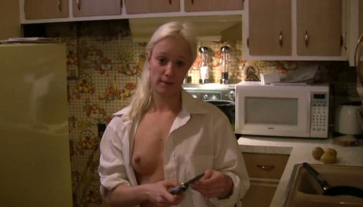 Caring girlfriend Jewel is cooking in the kitchen in porn pics