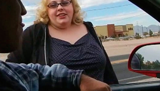 Blonde BBW wench with pale skin is giving a head in front of the camera porn pics