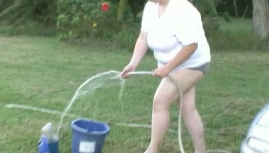 Wet carwash outdoor featuring nasty Caucasian BBW slut porn pics