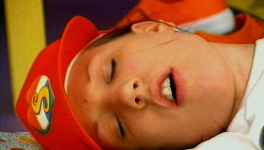 Amateur brunette chick rubs her clit while poking her twat with dildo porn pics