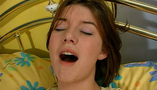 Brunette teen chick moans seductively while masturbating with long dildo porn pics