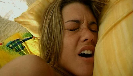 Big boobs hussy serves herself on  bed rubbing her pussy and sucking dildo porn pics