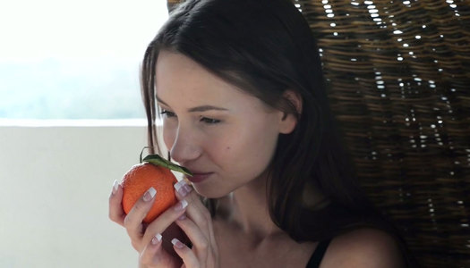 Cuddly brunette hottie strips seductively and starts masturbating passionately porn pics