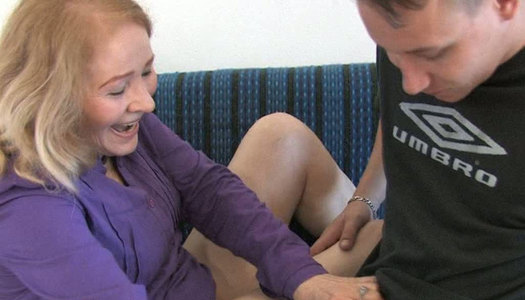 Incredibly spoiled granny gives her lover a nice handjob porn pics