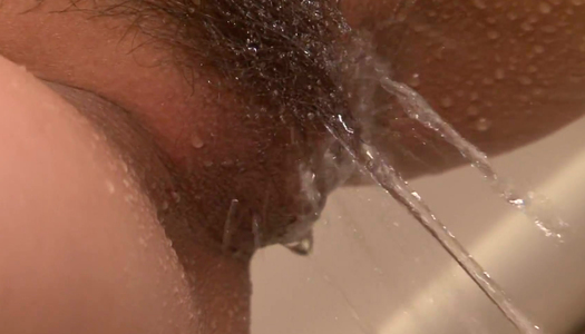 Shameless Japanese bitch Misa Kikouden pisses and rubs her big boobs porn pics