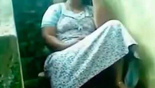 Fat and lusty Indian housewife sits on stair and fingerfucks her kitty porn pics