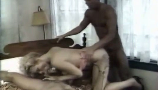 Two horny studs fucking one retro blonde doggy and missionary style porn pics