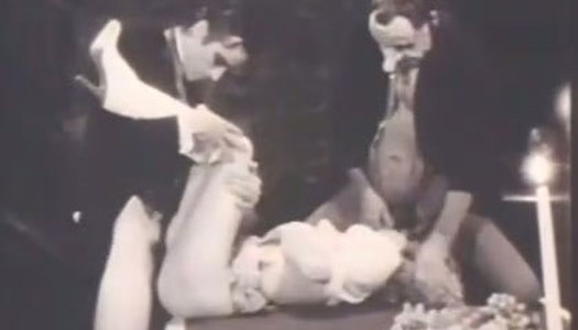 Black and white vid where blonde nympho gets fucked by two dudes porn pics