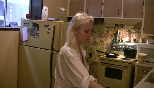 Svelte blonde amateur chick washes dishes and shows off her titties porn pics