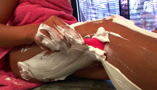 Attractive brunette girl Kat Young shaves her legs on cam porn pics