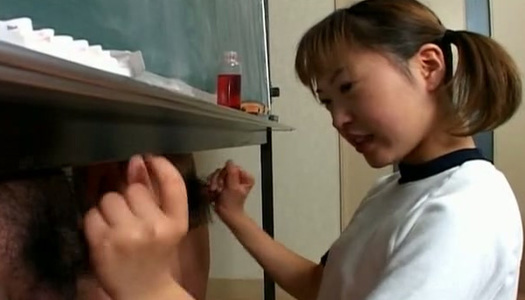 Standing behind the blackboard dude gets a nice handjob performed by cutie porn pics