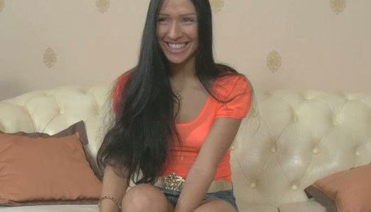 Skinny raven haired harlot in orange thongs performs oral skills on cam porn pics