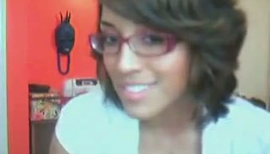 Four eyed Latina dances ans strips for the webcam porn pics