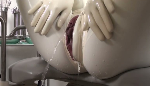 Latex lesbos examine each others wet muffs on a gynochair porn pics