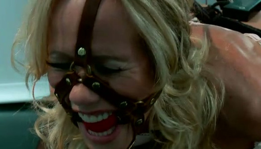 Hot mistress in stockings tries to destroy slave's pussy with big sex toy porn pics