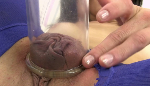 Extremely attractive brunette fucks her snatch with her ribbed glass dildo porn pics