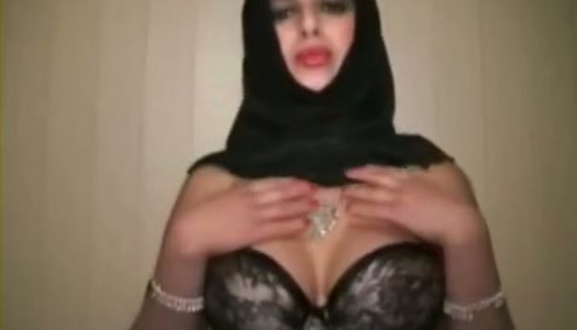 Bright brunette in shawl flashes her mesmerizing huge titties porn pics