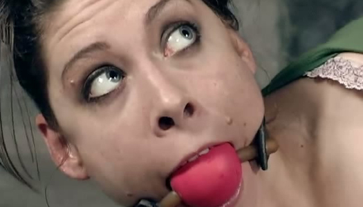 Long stick punishes brunette chick lying on the cold floor porn pics