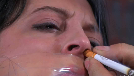 Perverted man ties up chick and puts cigarette in her nose porn pics