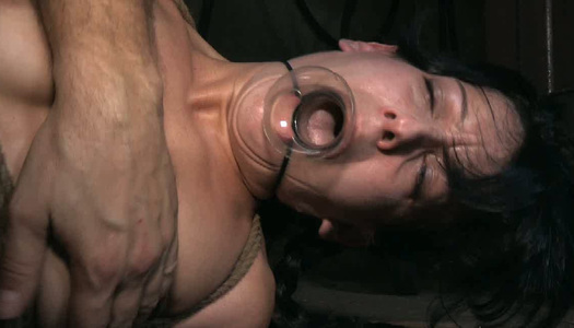 Sexy brunette is fucked with spray of water in the dark room porn pics