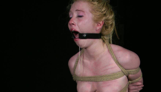 Sexy bondage blonde is moaning with pain porn pics