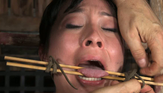 Hard tied chick is punished in the basement porn pics