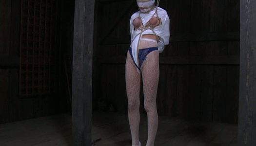 Restrained sex-slave with mask on her head gets punished in the dungeon porn pics