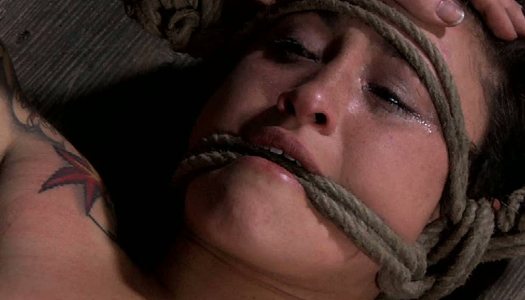 Nude bondage sex-slave is lying on the cold floor porn pics