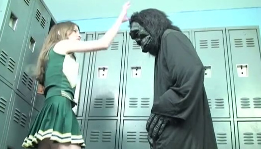 Kinky cheerleader kicks dude in a funny costume in his balls porn pics