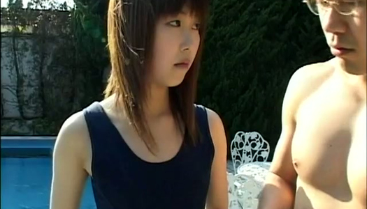 Attractive Japanese girl stretching by the poolside outdoor porn pics