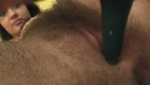 Kinky busty brunette teen uses Fertility statuette to fuck her own twat porn pics