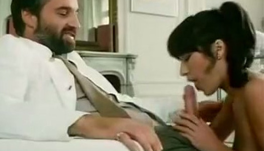 Wondrous vintage brunette girlie in black stockings rides and blows dick porn pics