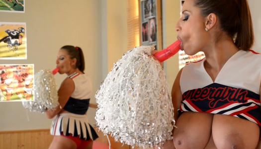Mega busty cheerleader plays with boobs and pussy in front of a mirror porn pics