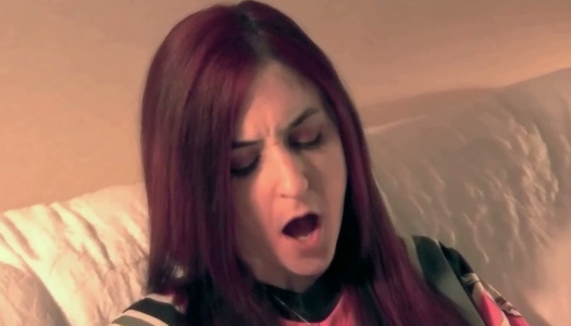 Kinky redhead Ruby enjoys teasing her own twat with clitoral vibrator porn pics