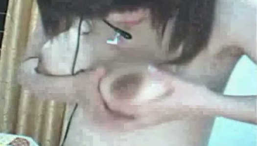 Slutty Asian girl plays with her tight perky tits on webcam porn pics