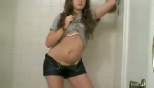 Dark haired slutty wench strips in front camera for the first time porn pics